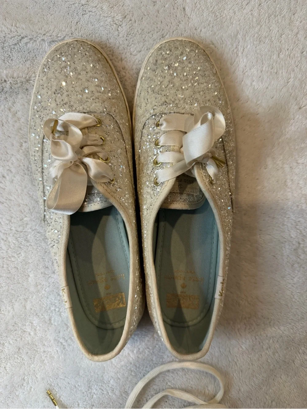 Keds x Kate Spade New York Glitter Sneakers in cream with original packaging